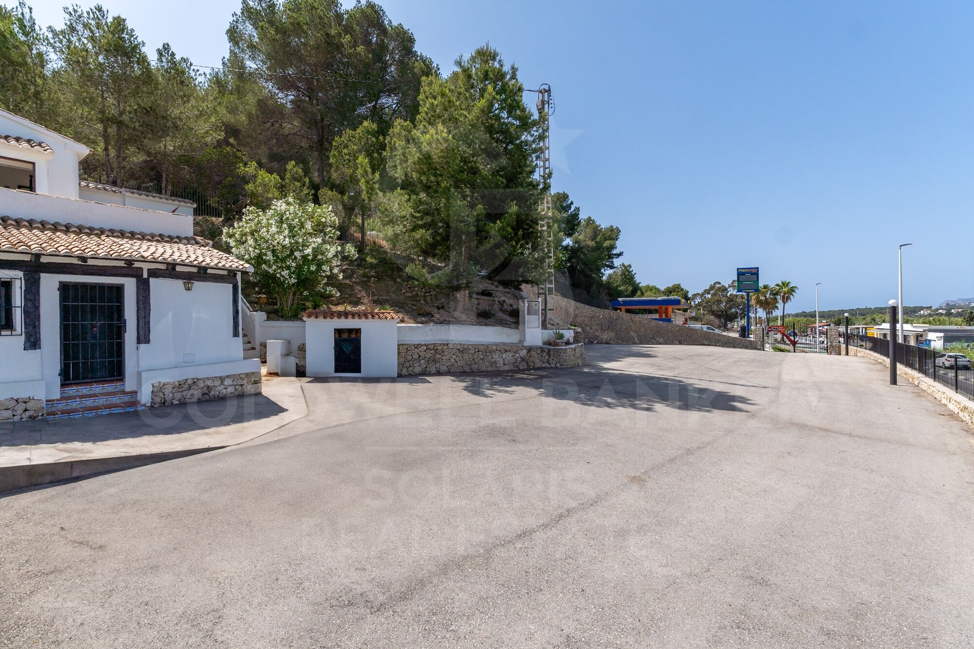 Exclusive Commercial Property with Ample Parking and Adjacent Living