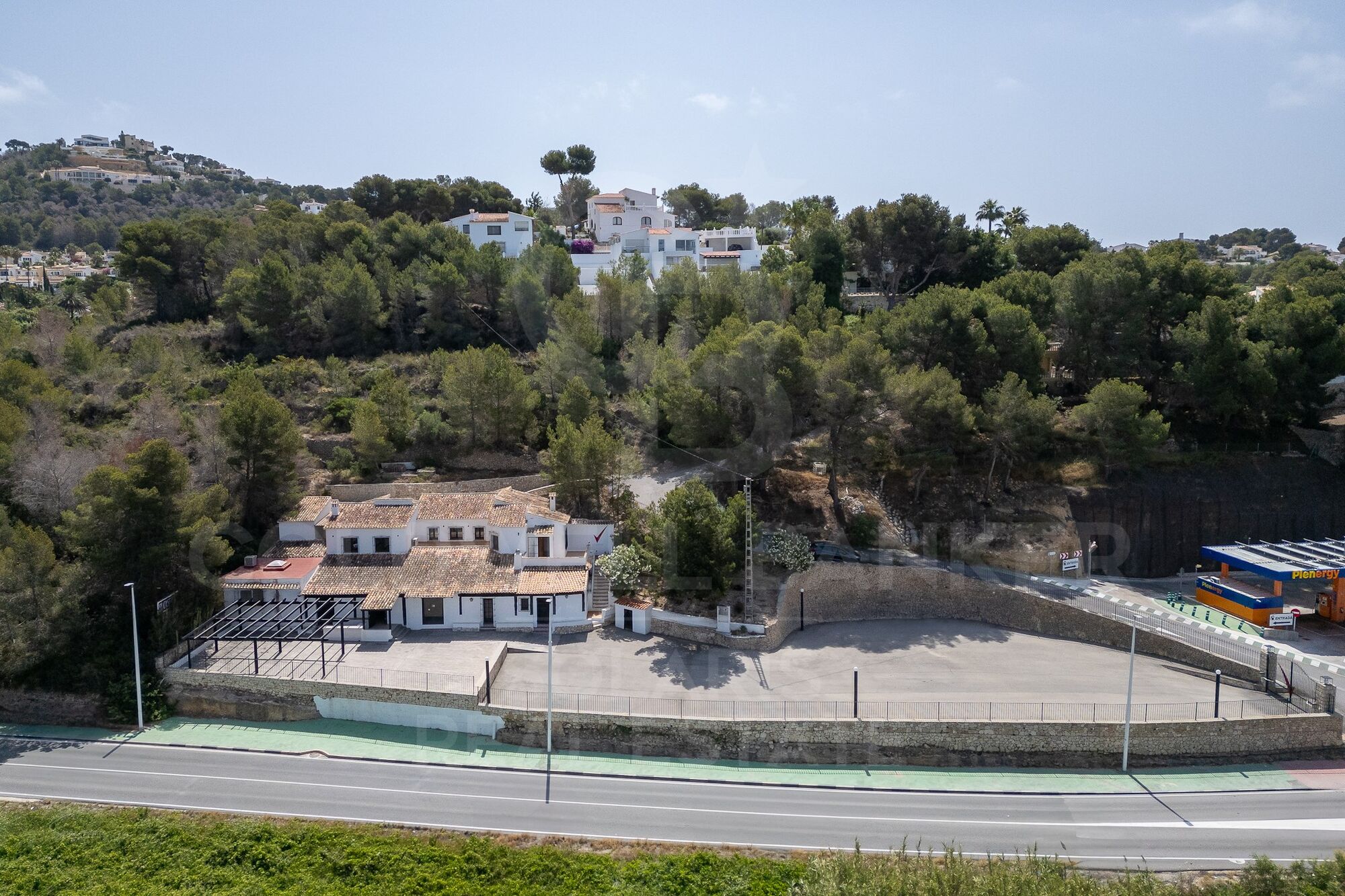Exclusive Commercial Property with Ample Parking and Adjacent Living