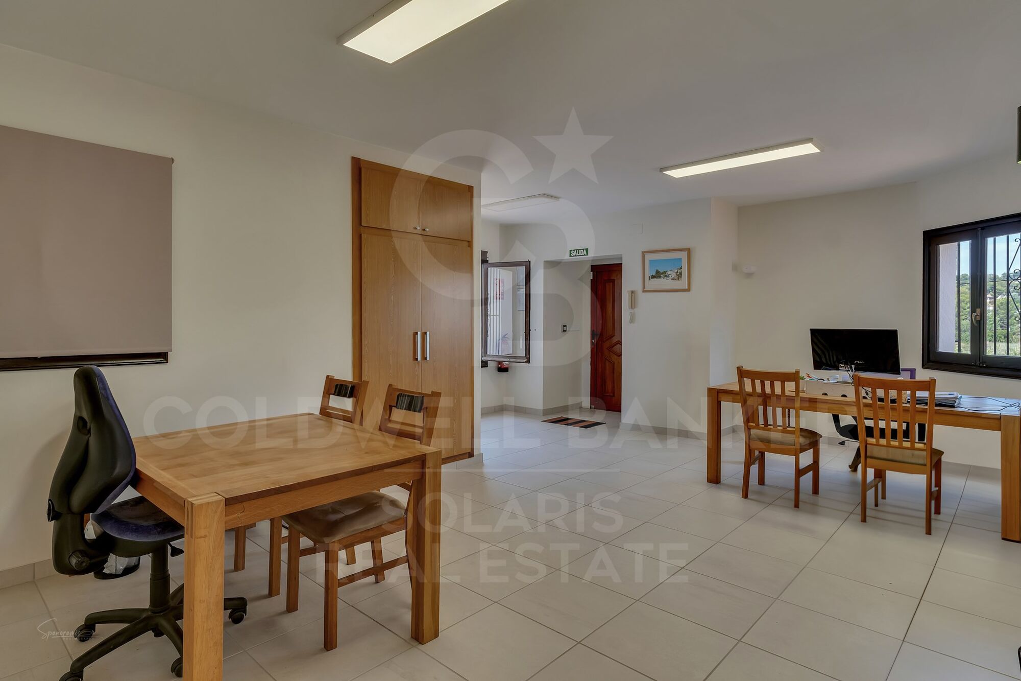 Exclusive Commercial Property with Ample Parking and Adjacent Living