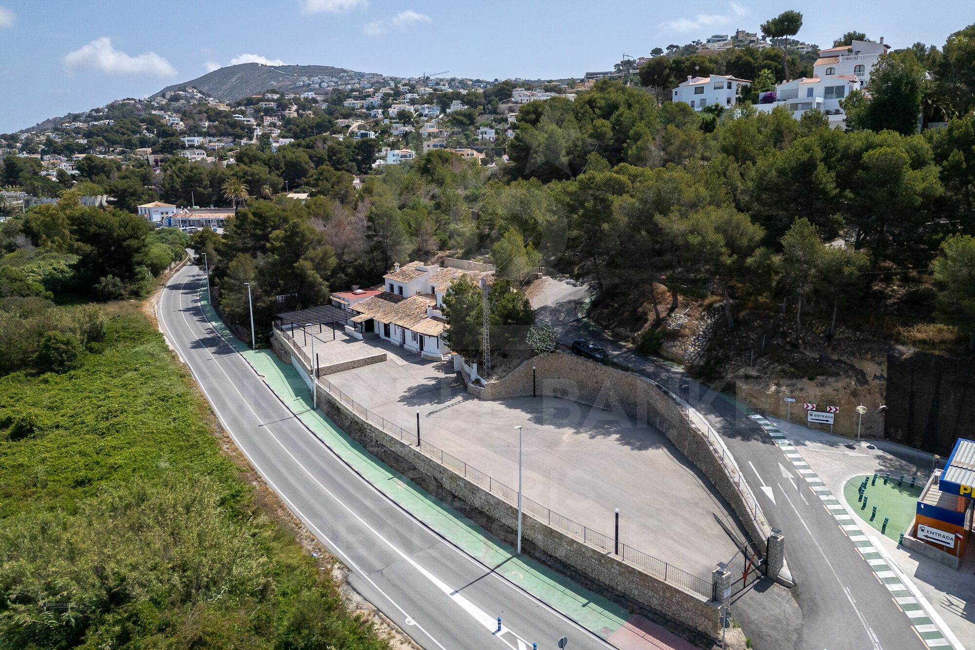 Exclusive Commercial Property with Ample Parking and Adjacent Living