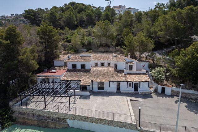 Exclusive Commercial Property with Ample Parking and Adjacent Living