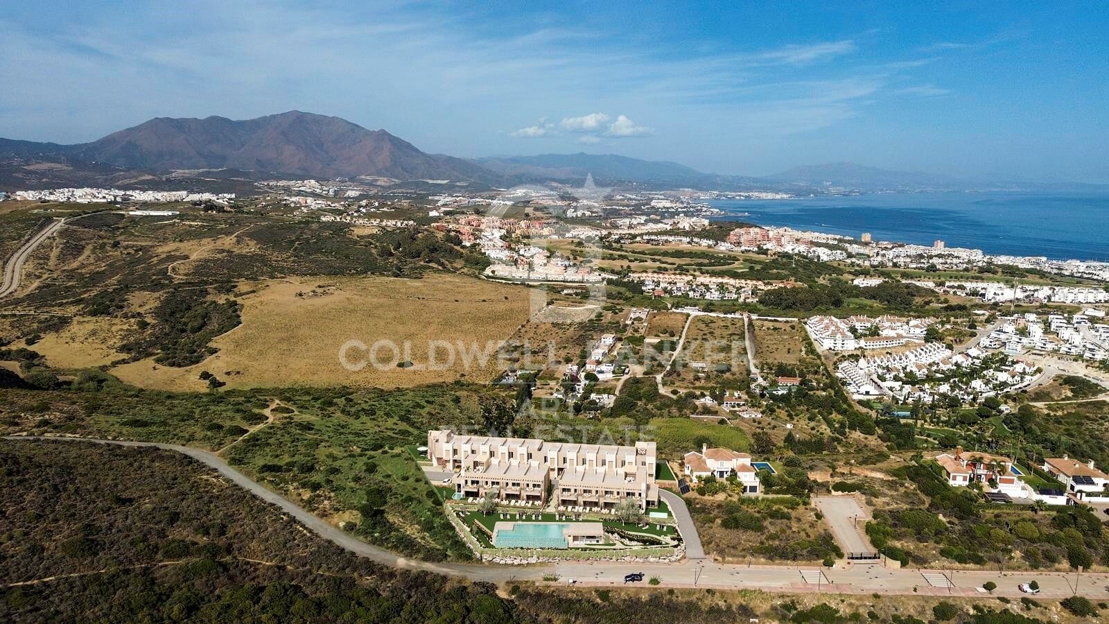 New townhouses with sea views in Manilva