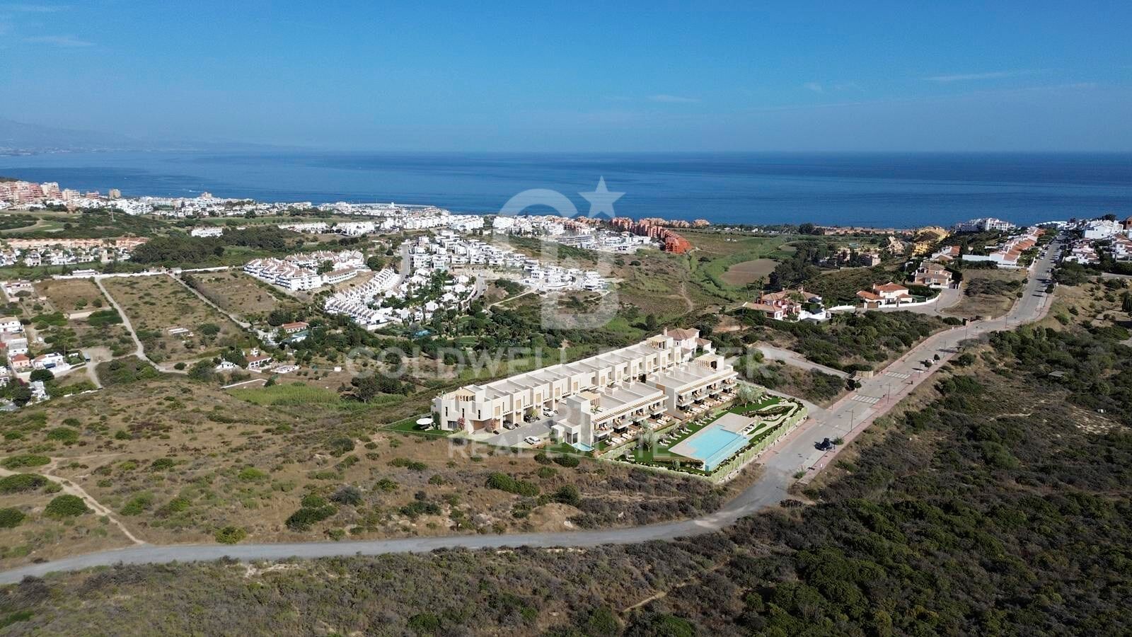 New townhouses with sea views in Manilva