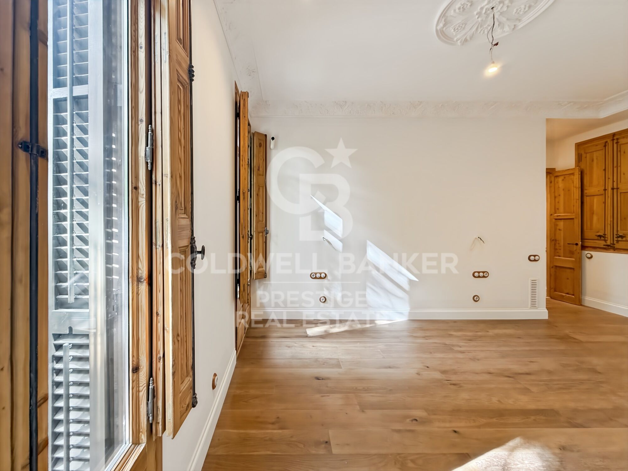 Renovated apartment in period building by Enric Granados