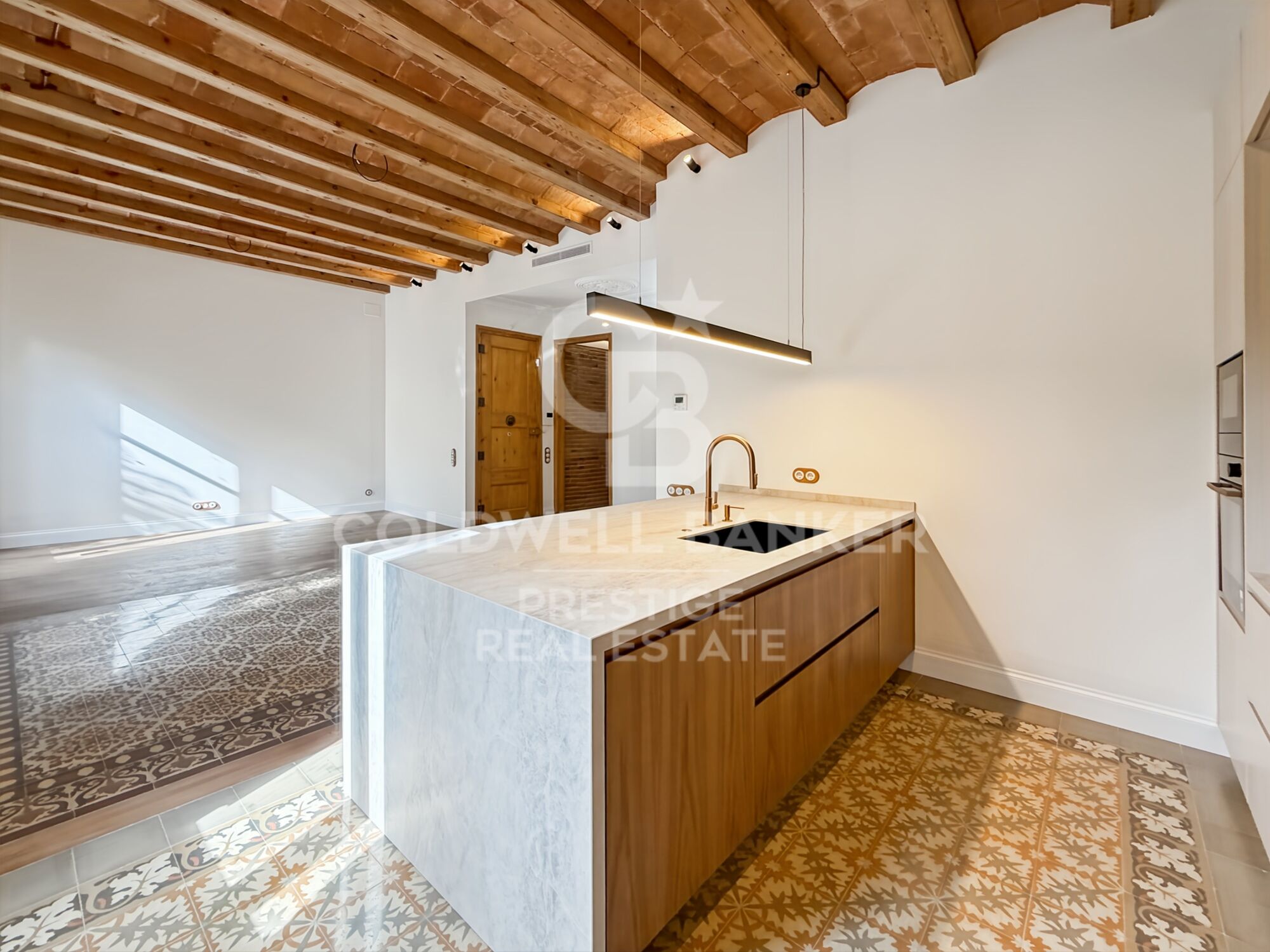Renovated apartment in period building by Enric Granados