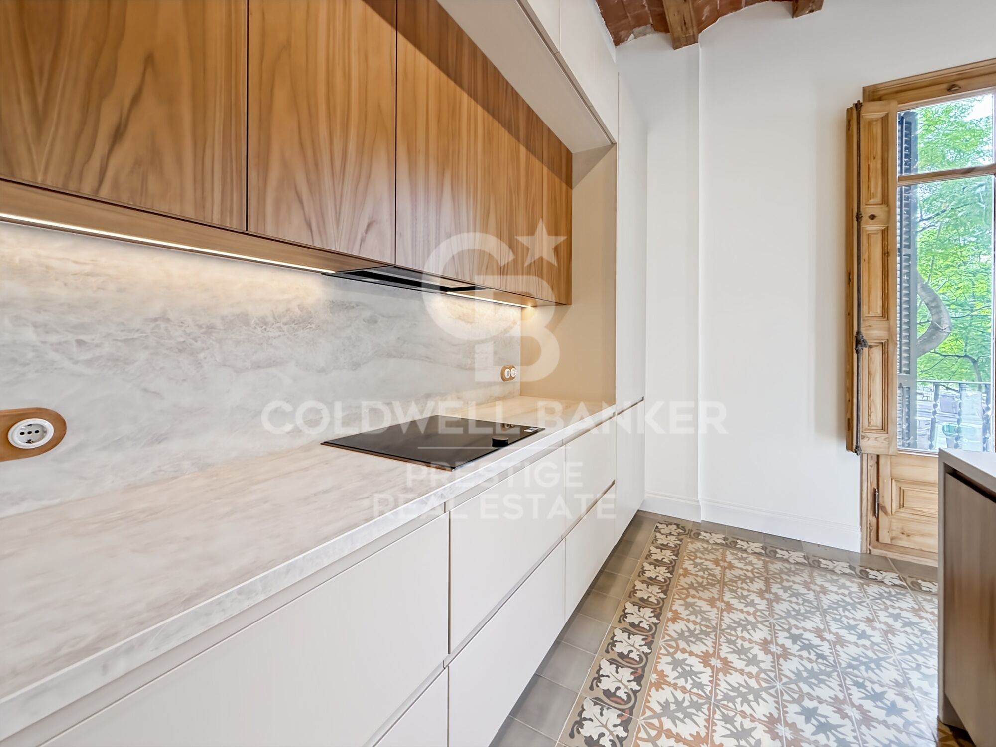 Renovated apartment in period building by Enric Granados