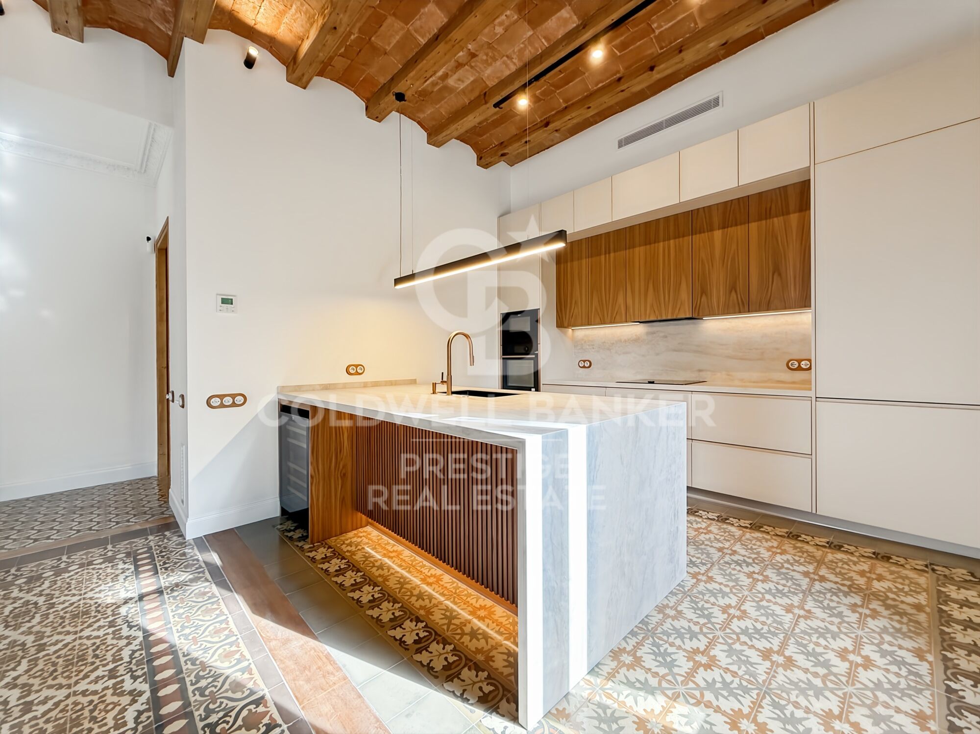 Renovated apartment in period building by Enric Granados