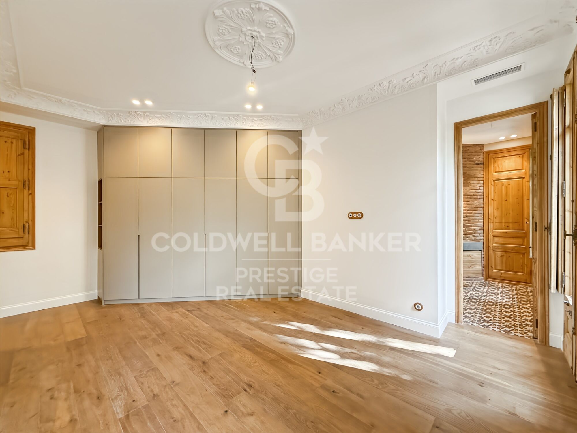 Renovated apartment in period building by Enric Granados