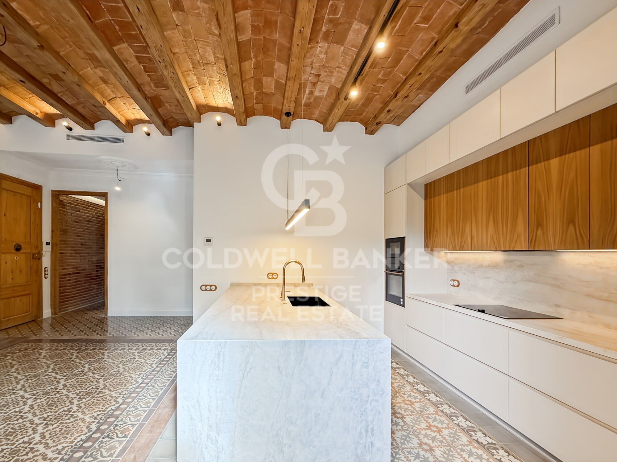 Renovated apartment in period building by Enric Granados
