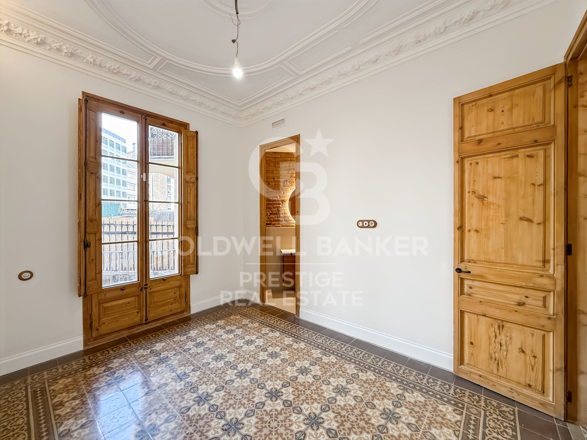 Renovated apartment in period building by Enric Granados