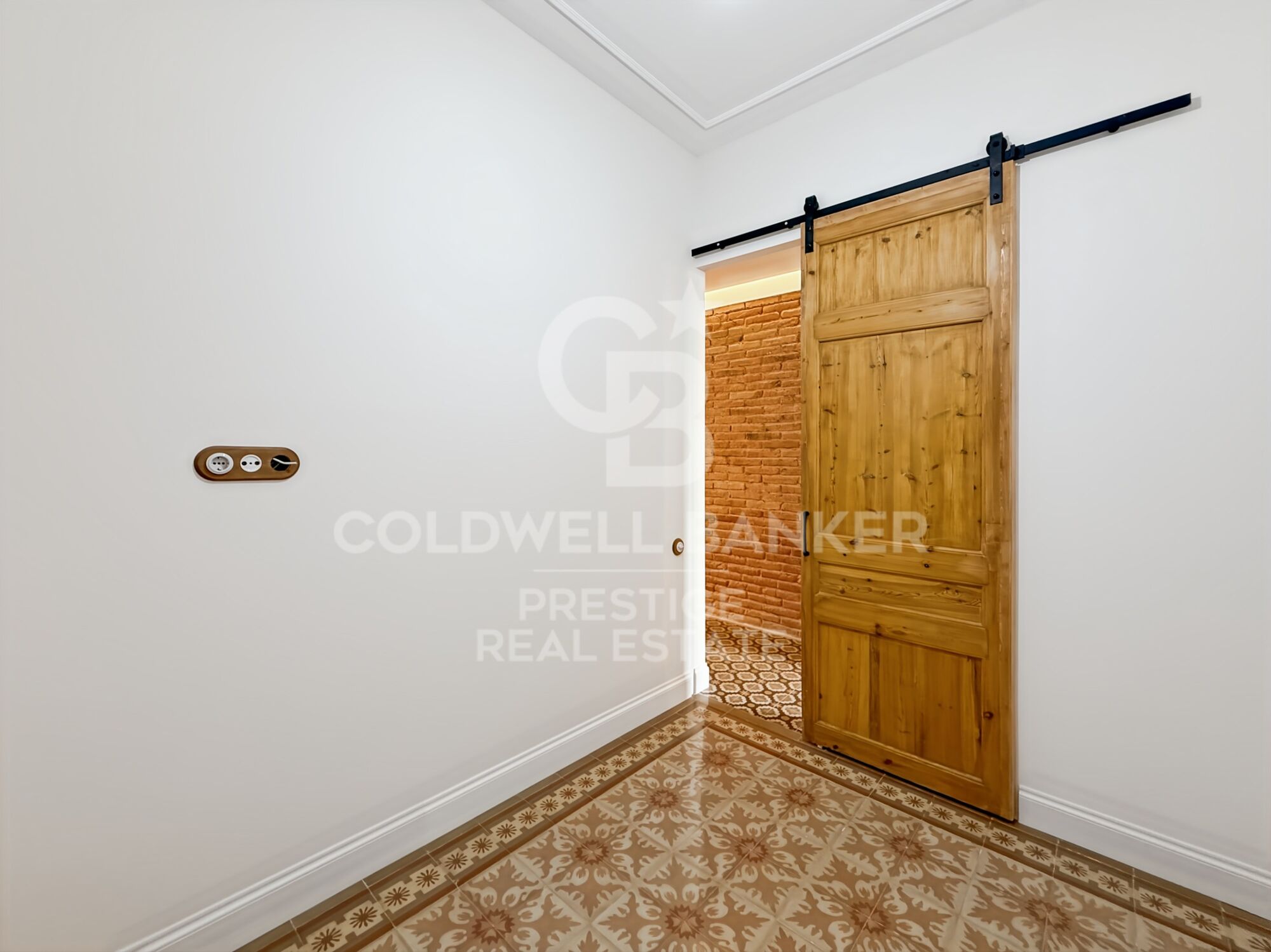 Renovated apartment in period building by Enric Granados