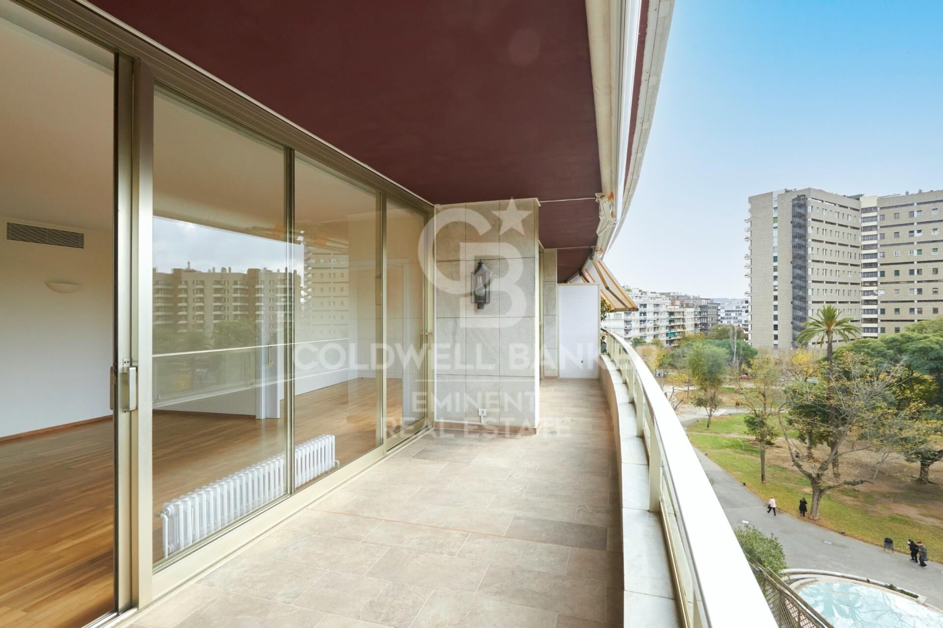 Exclusive luxury apartment for rent in the upper area of Barcelona with terrace, views, and parking.