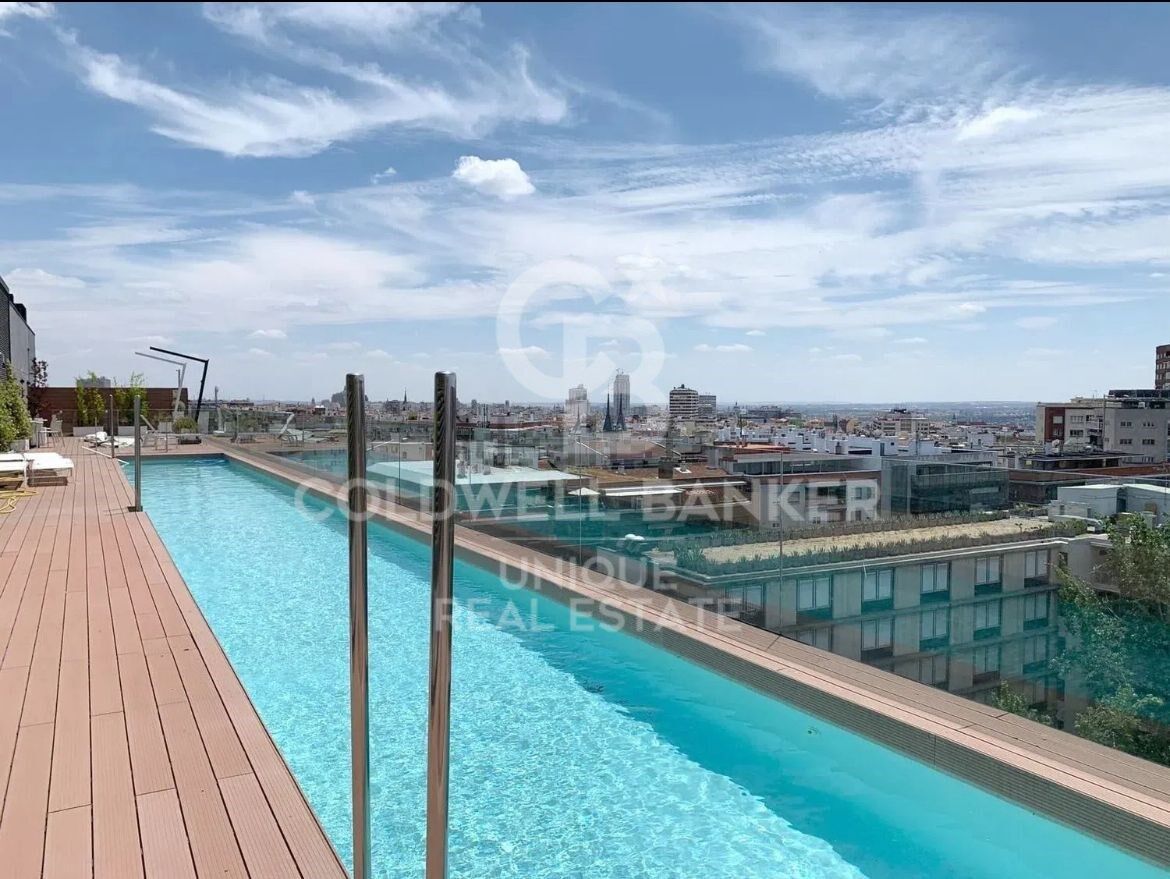 Duplex penthouse with terrace, pool, garage and storage room in Chamberí, Madrid