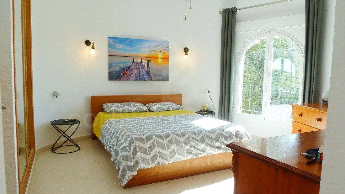 House / Villa for sale in Cumbre del Sol with sea and mountain views