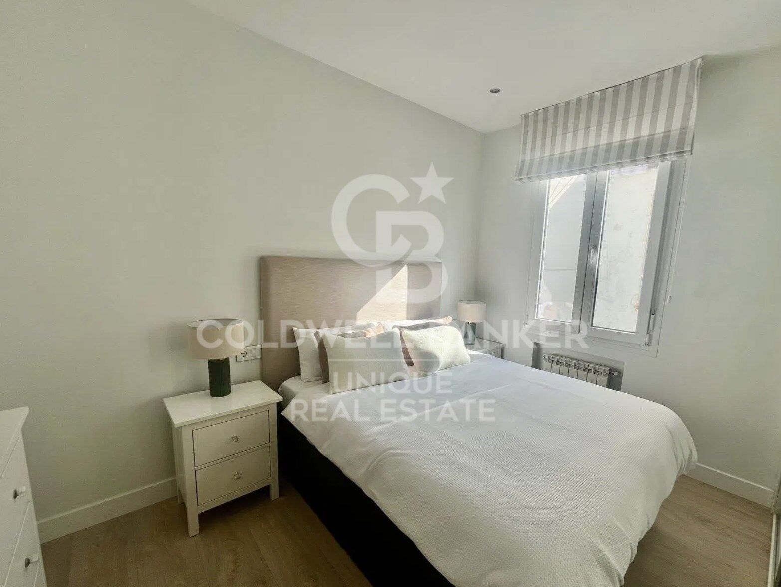 Exclusiva vivienda reformada en última planta con gran luminosidad