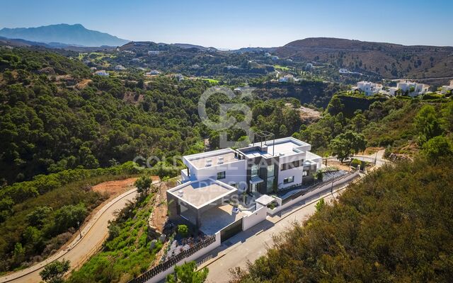 Brand new modern villa offering open countryside views in the beautiful hillside residence of Monte Mayor, Benahavis
