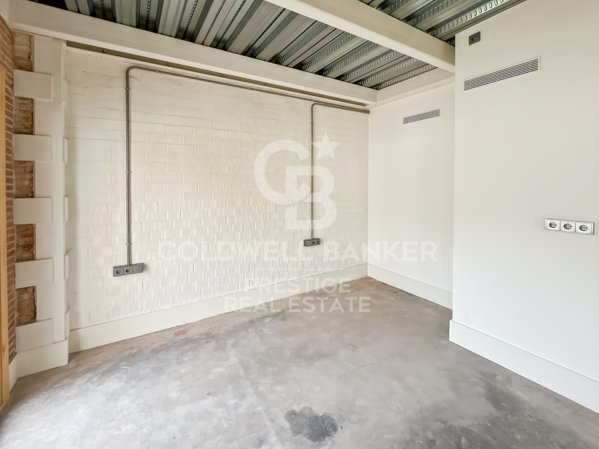 New development of 4 refurbished emblematic buildings with unique lofts for sale in Poblenou, Barcelona.