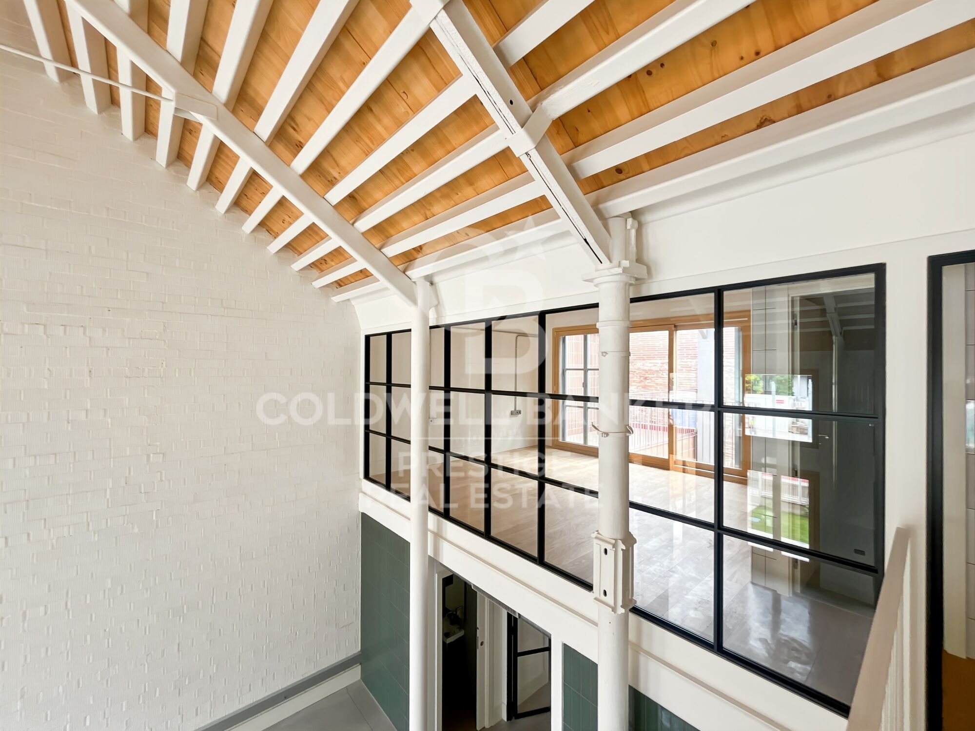 New development of 4 refurbished emblematic buildings with unique lofts for sale in Poblenou, Barcelona.