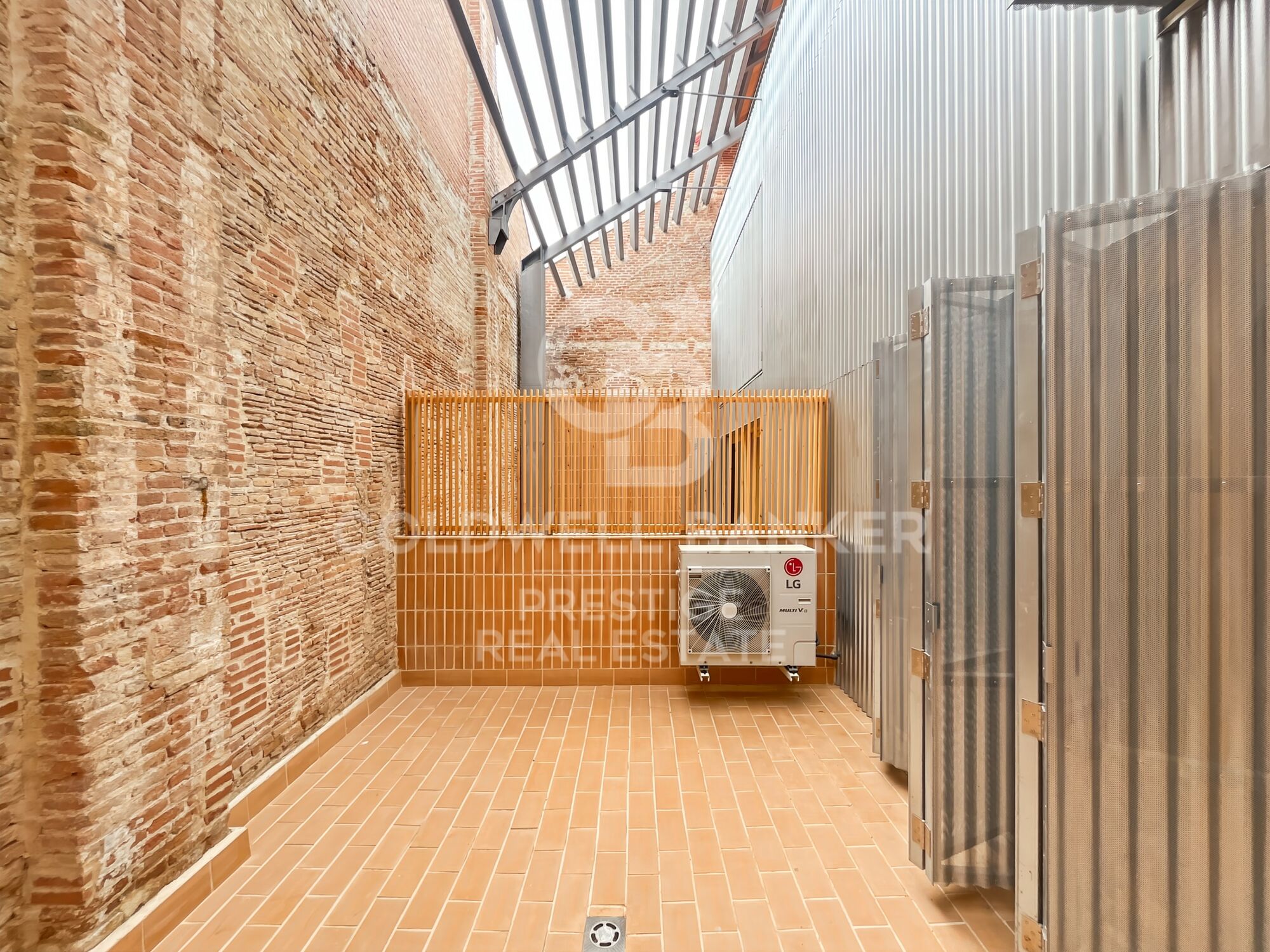 New development of 4 refurbished emblematic buildings with unique lofts for sale in Poblenou, Barcelona.