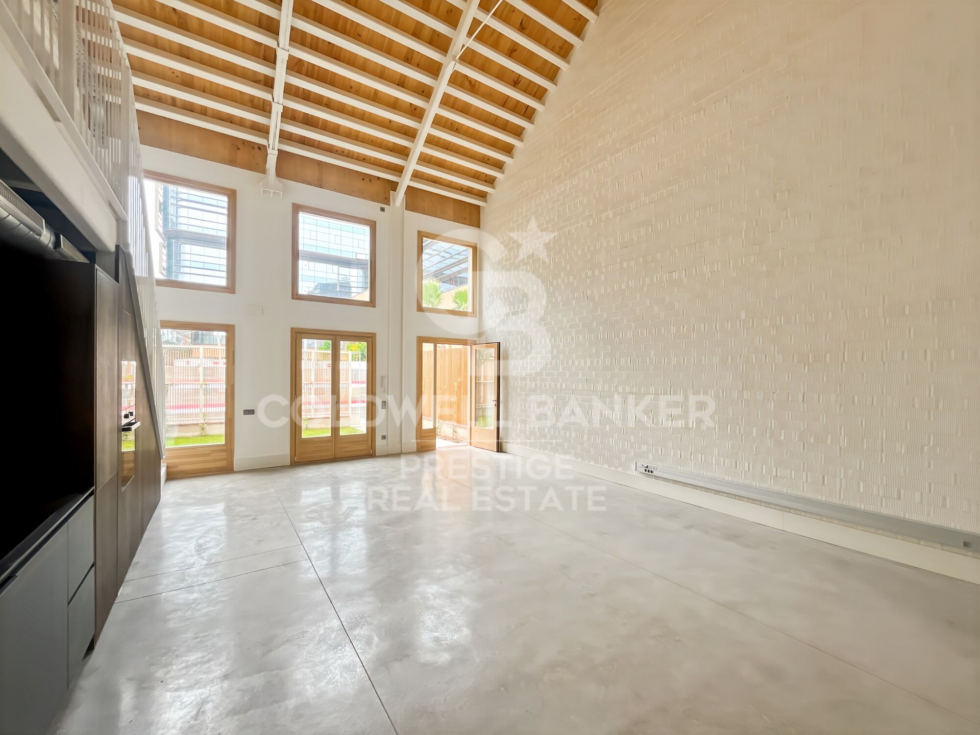 New development of 4 refurbished emblematic buildings with unique lofts for sale in Poblenou, Barcelona.