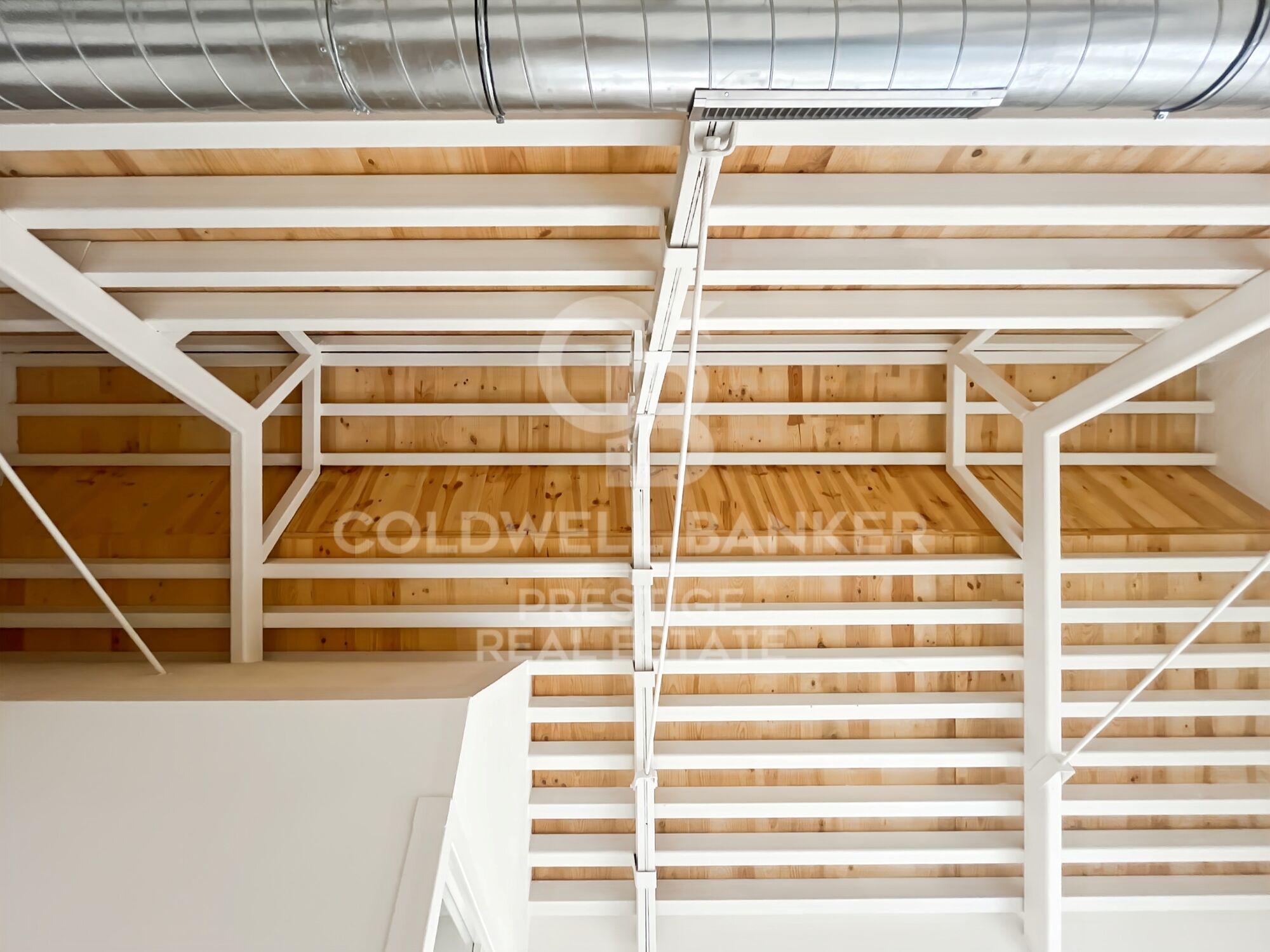 New development of 4 refurbished emblematic buildings with unique lofts for sale in Poblenou, Barcelona.