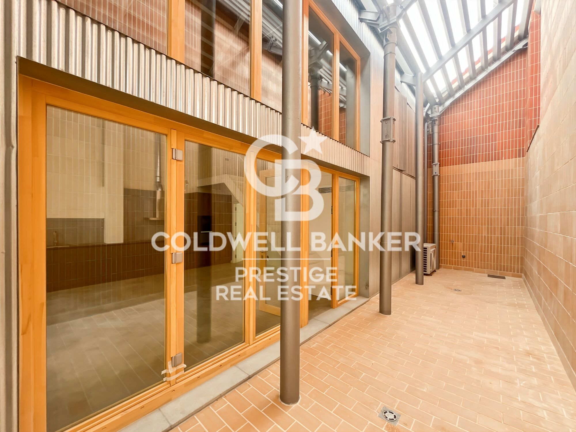 New development of 4 refurbished emblematic buildings with unique lofts for sale in Poblenou, Barcelona.