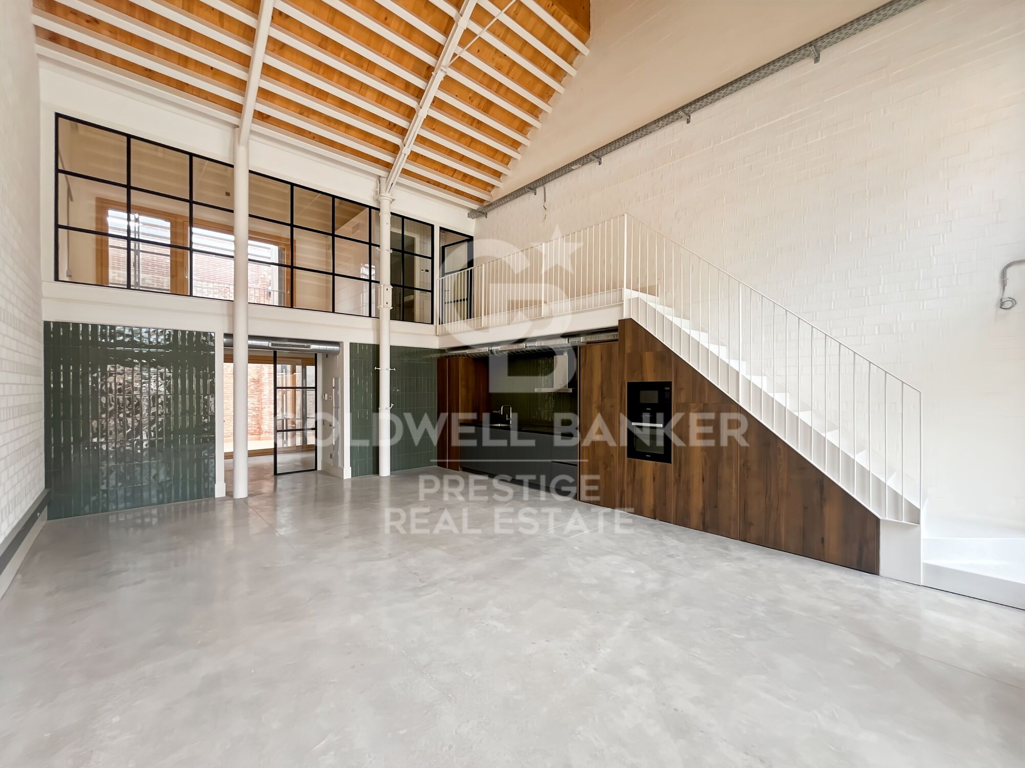 New development of 4 refurbished emblematic buildings with unique lofts for sale in Poblenou, Barcelona.