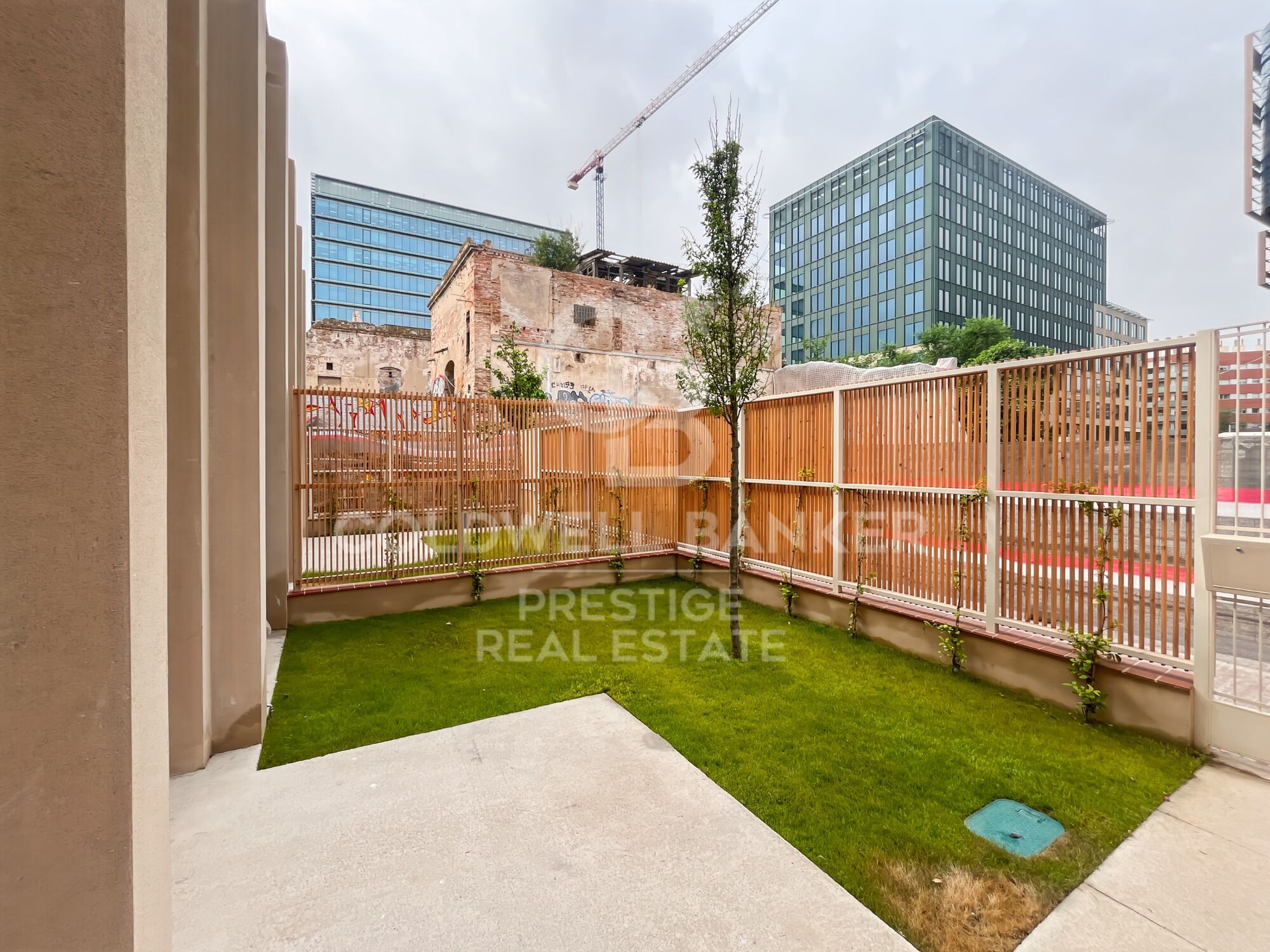 New development of 4 refurbished emblematic buildings with unique lofts for sale in Poblenou, Barcelona.