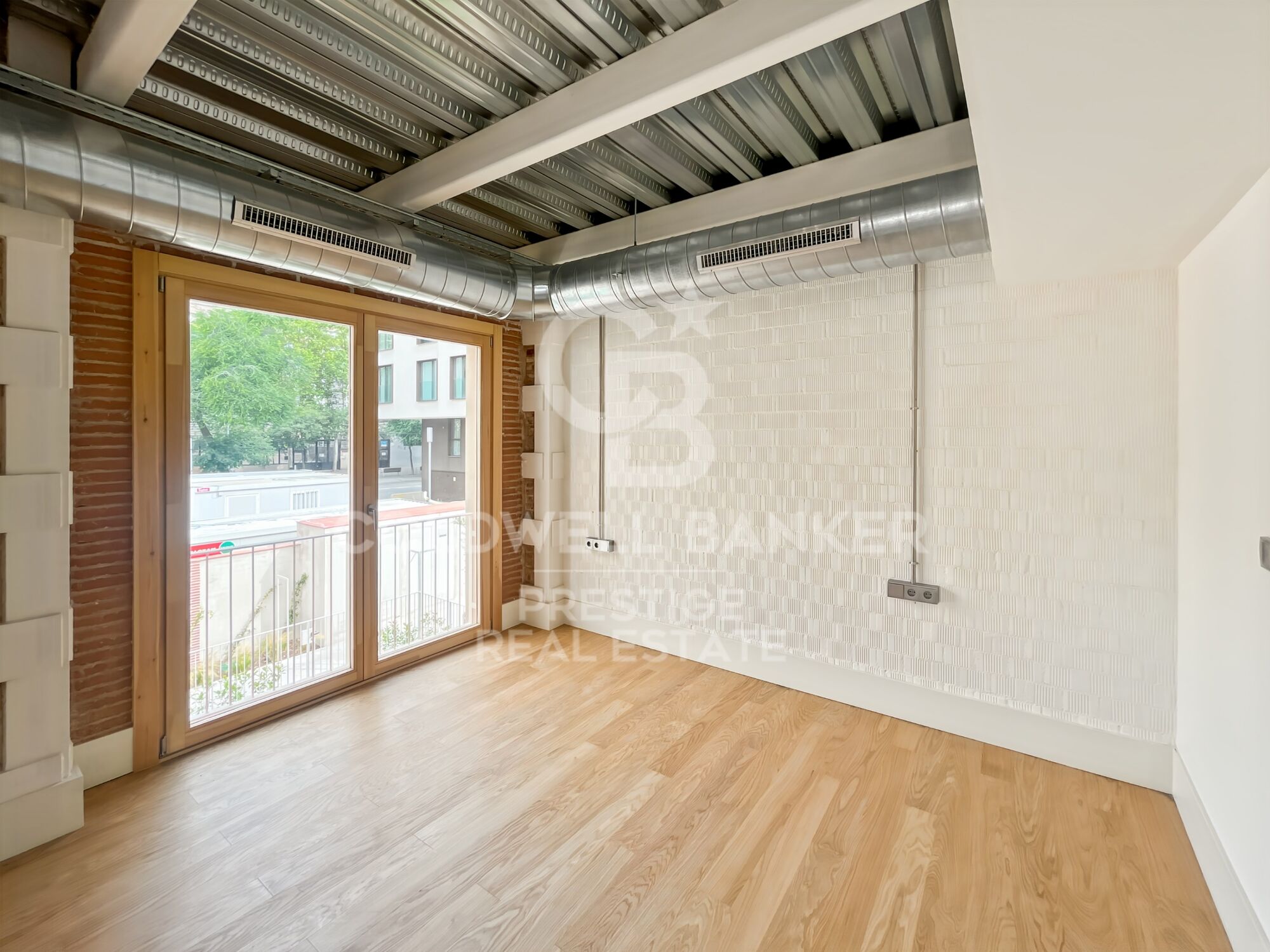 New development of 4 refurbished emblematic buildings with unique lofts for sale in Poblenou, Barcelona.