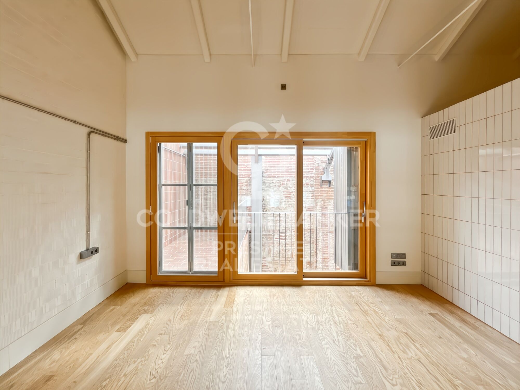 Nouveau développement de 4 bâtiments emblématiques rénovés avec des lofts uniques à vendre à Poblenou, Barcelone.