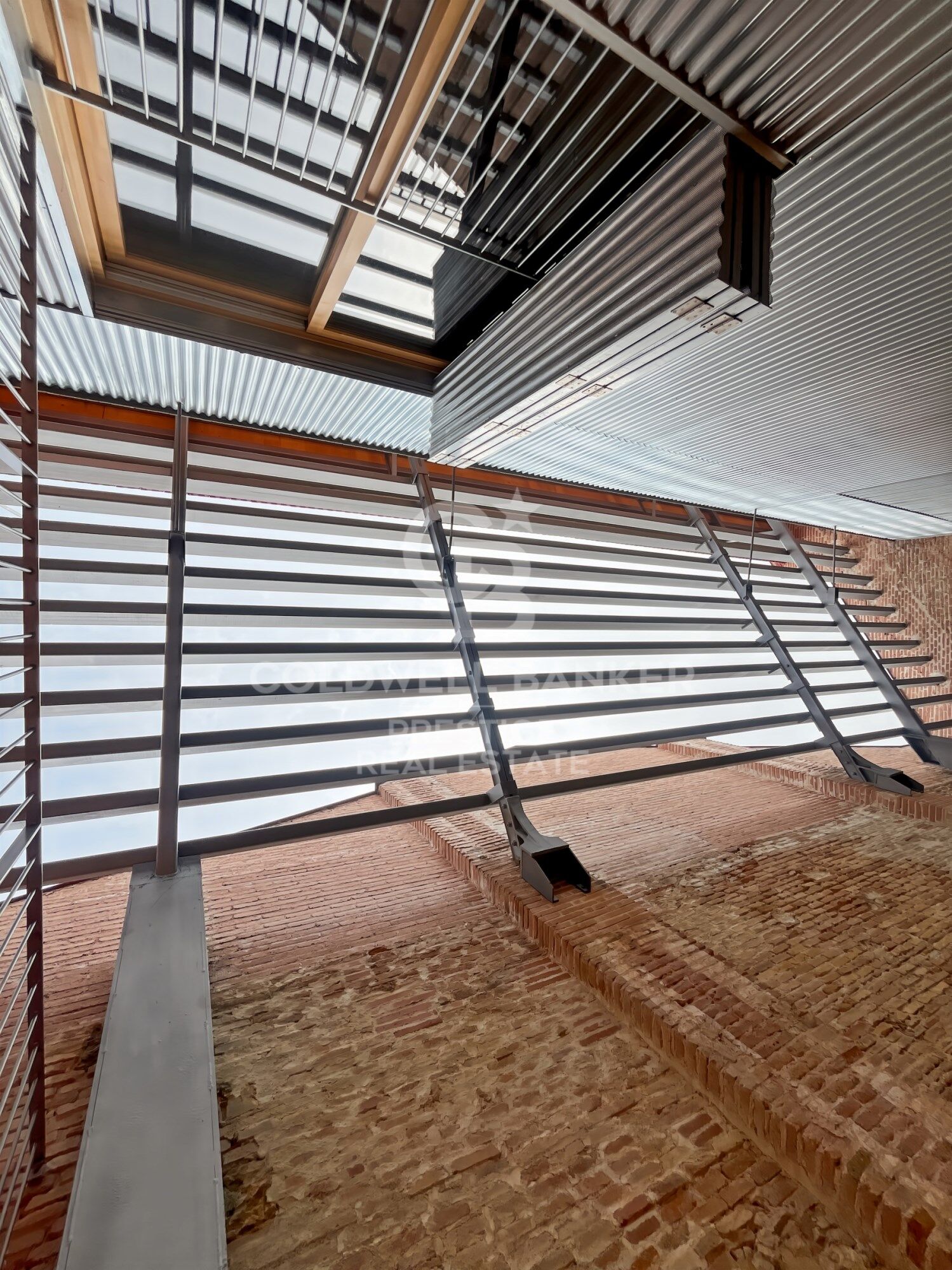 New development of 4 refurbished emblematic buildings with unique lofts for sale in Poblenou, Barcelona.