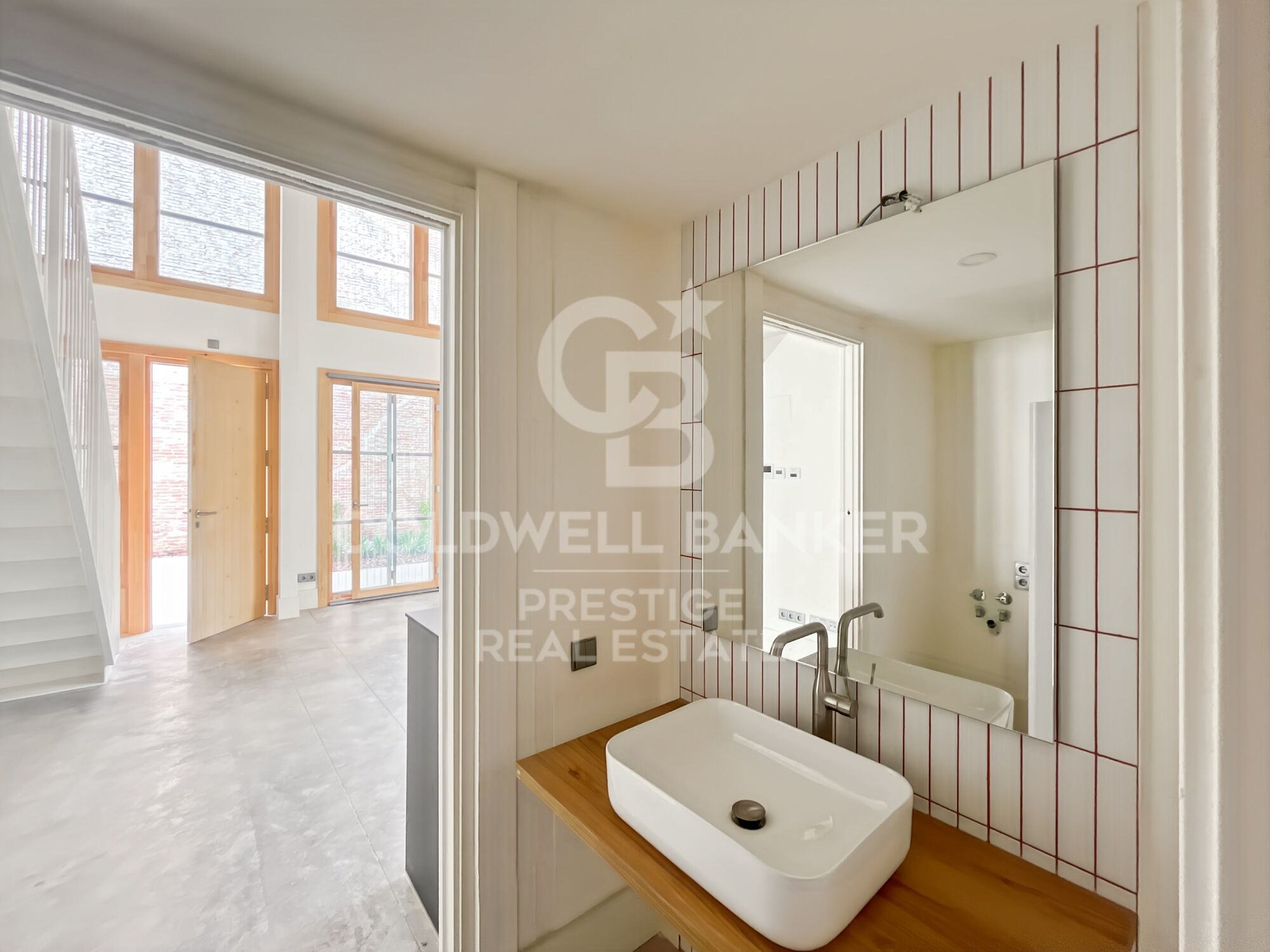 New development of 4 refurbished emblematic buildings with unique lofts for sale in Poblenou, Barcelona.