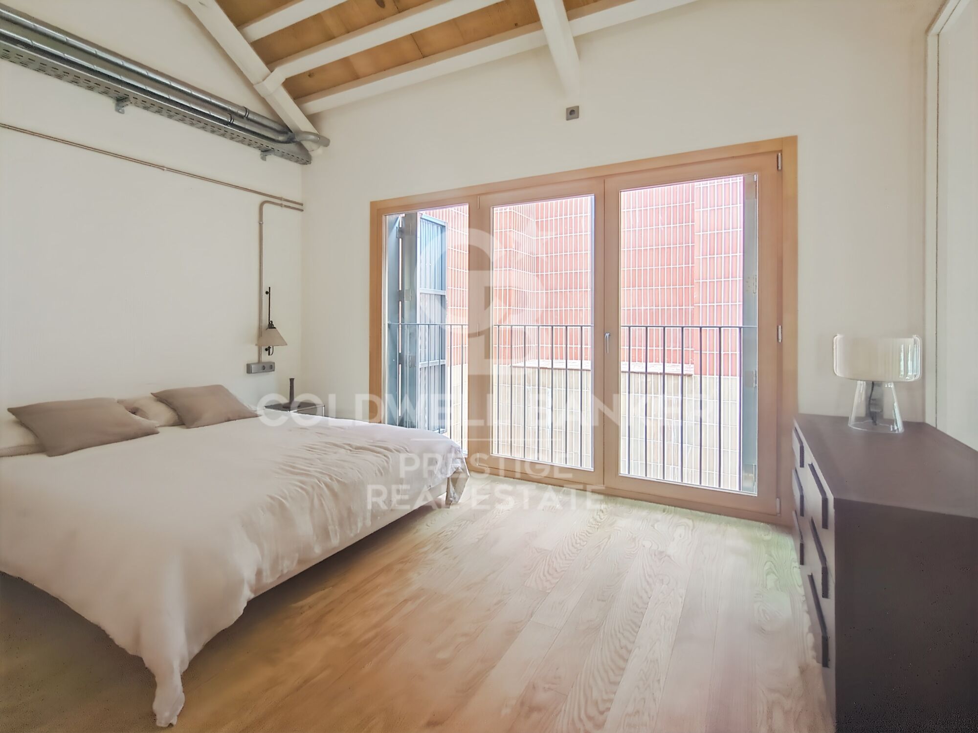 New development of 4 refurbished emblematic buildings with unique lofts for sale in Poblenou, Barcelona.