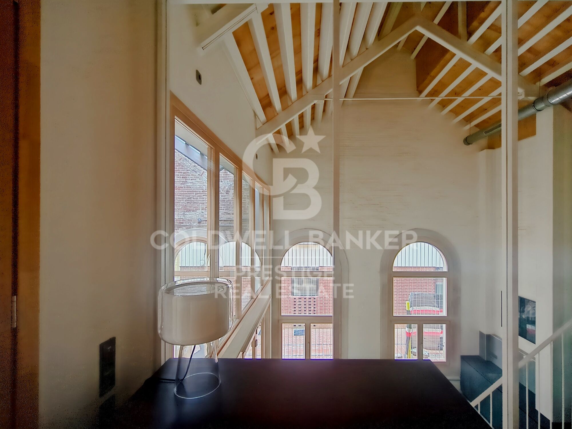New development of 4 refurbished emblematic buildings with unique lofts for sale in Poblenou, Barcelona.