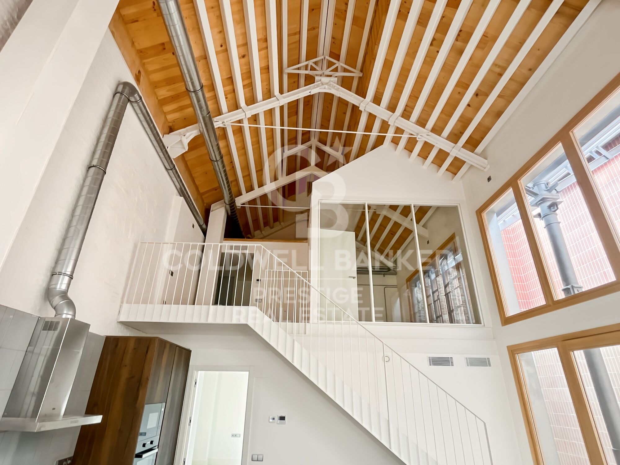2 bedroom loft duplex for sale with terrace in a refurbished building in Poblenou, Barcelona