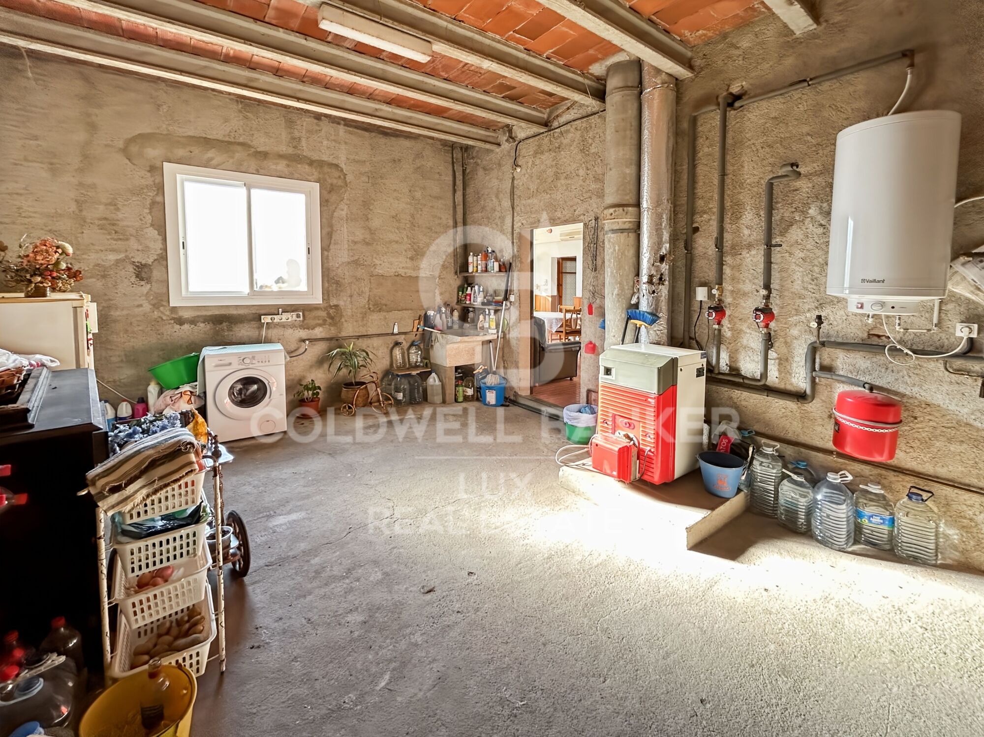 Stadthaus mit sonniger Terrasse und Garage in Borrassà. Zu renovieren