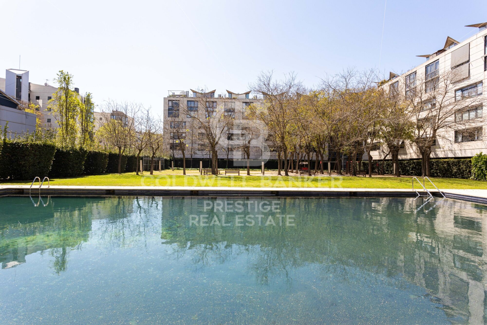 Spectacular renovated apartment with balcony, pool and just steps from the beach.