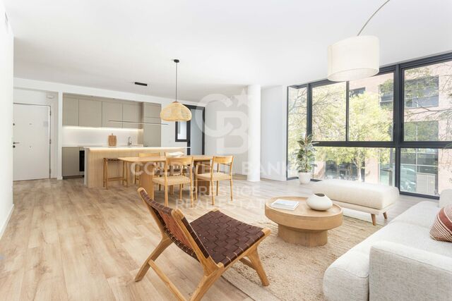 Spectacular renovated apartment with balcony, pool and just steps from the beach.