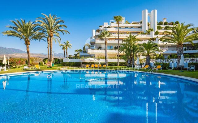 Modern luxury apartment with terrace, pool &amp; gym on Marbella's Golden Mile
