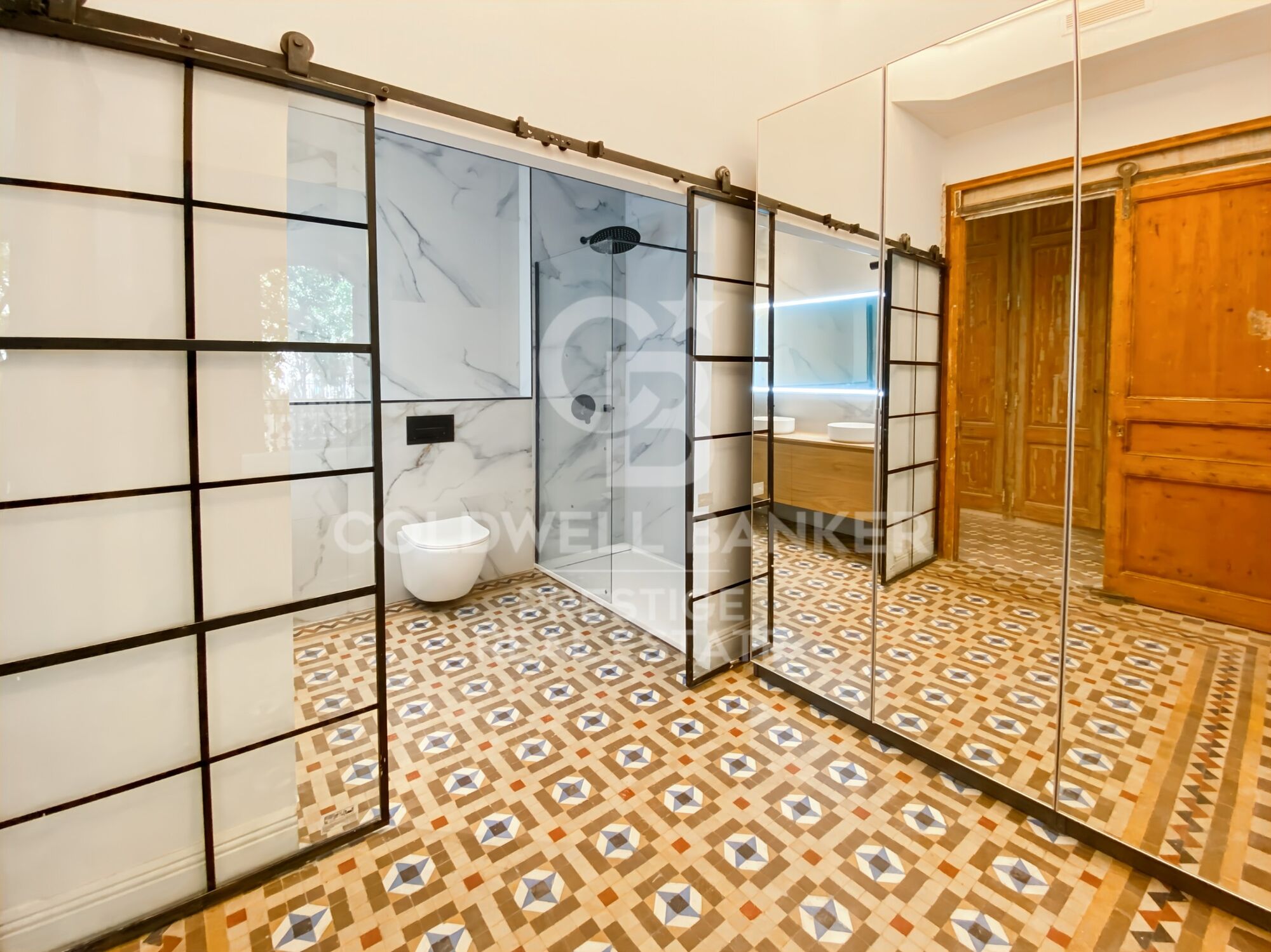 Renovated Apartment for Sale in Eixample Barcelona with Large Terrace