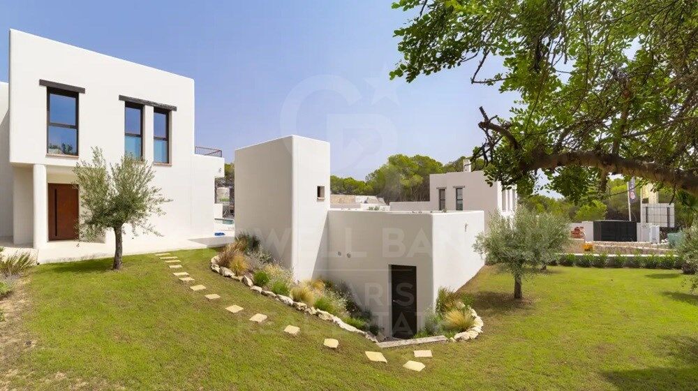 L'élégance d'Ibiza à Moraira : nouvelle villa avec piscine, jardin et vue imprenable