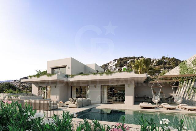 L'élégance d'Ibiza à Moraira : nouvelle villa avec piscine, jardin et vue imprenable