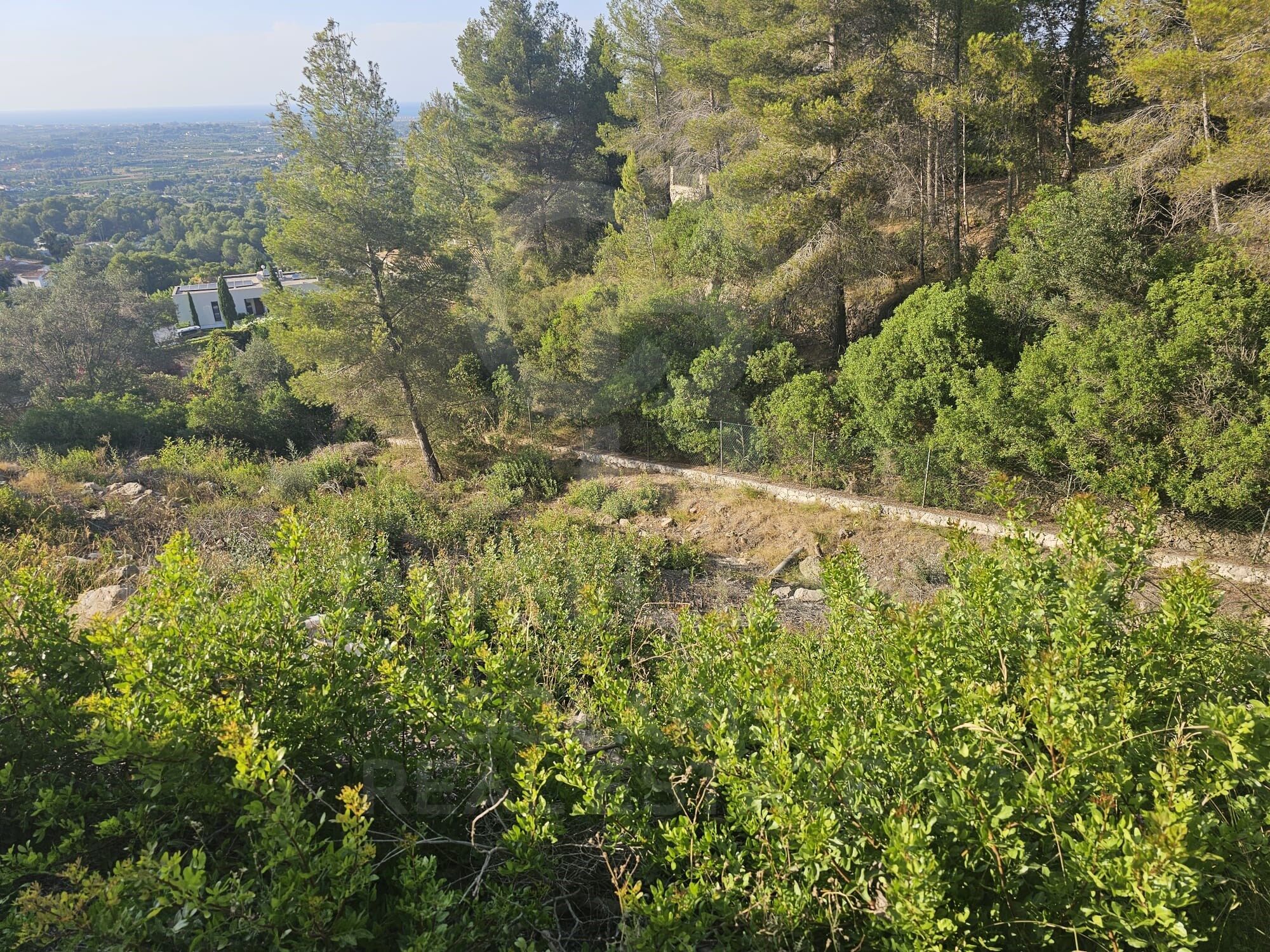 Parcela exclusiva en La Sella Golf - 2.295m² con vistas al mar y al Montgó