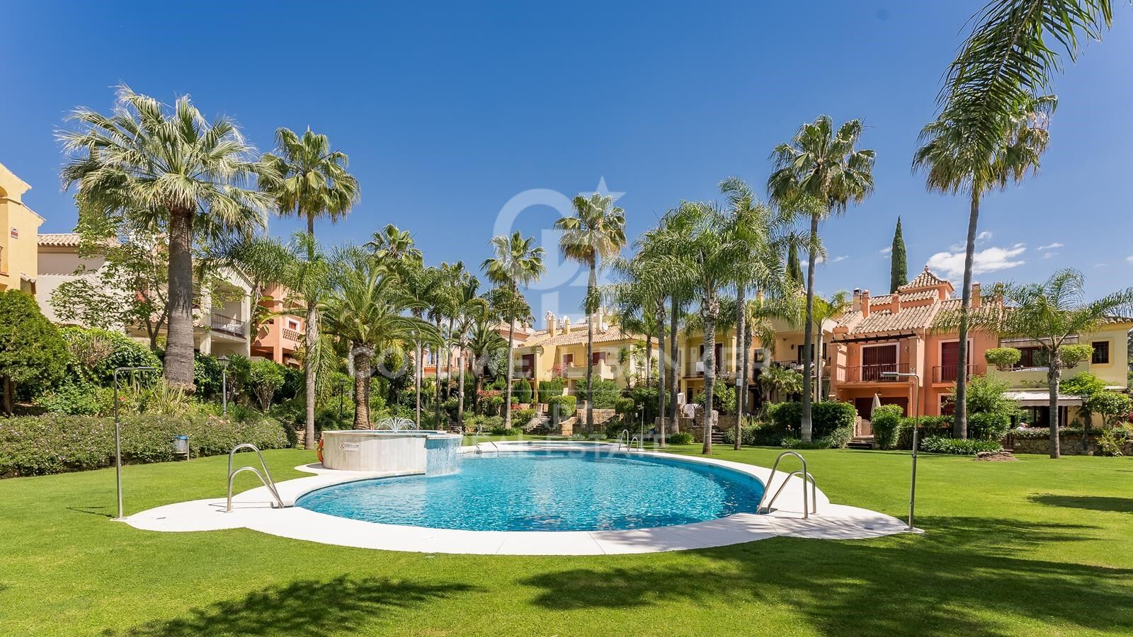 Refined semi-detached home in exclusive Jardines de Las Lomas - Marbella's Golden Mile